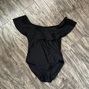 Black one-piece swimsuit with ruffle detail